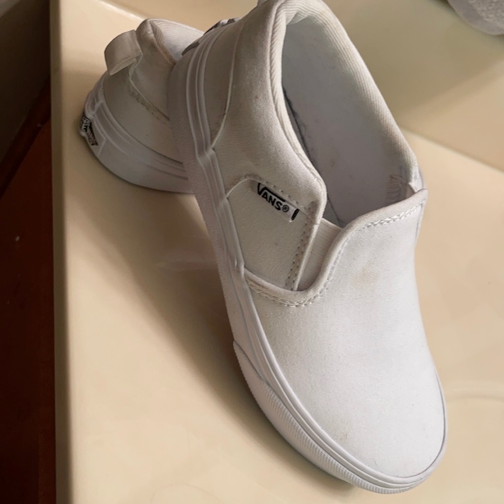 All white vans slip ons